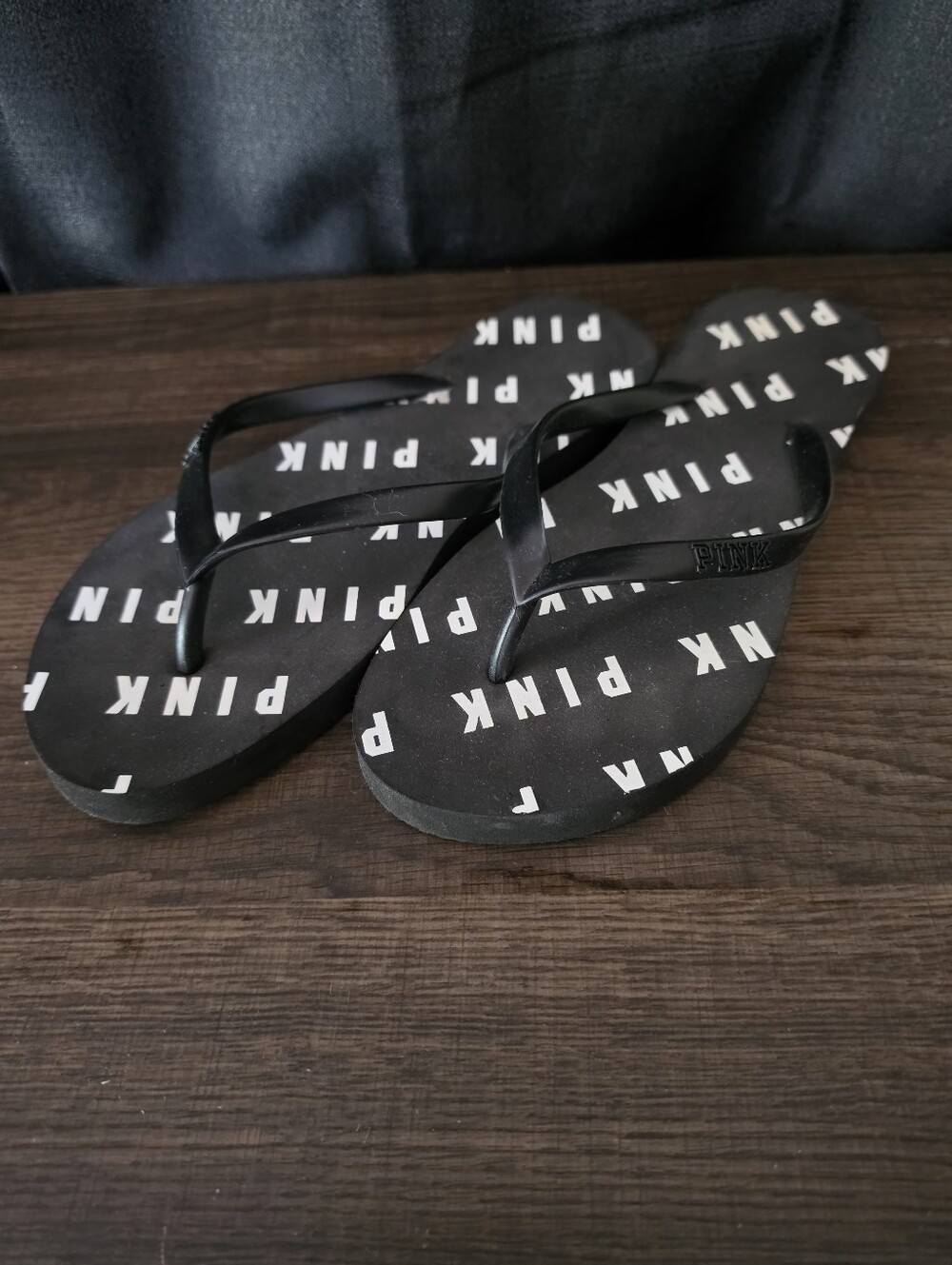 PINK Victoria's Secret Black Flip Flop Sandals with White Logo Print